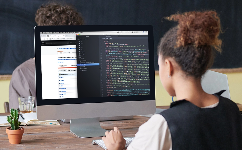 The original Delta Design System GitHub repo and source code displayed on a monitor